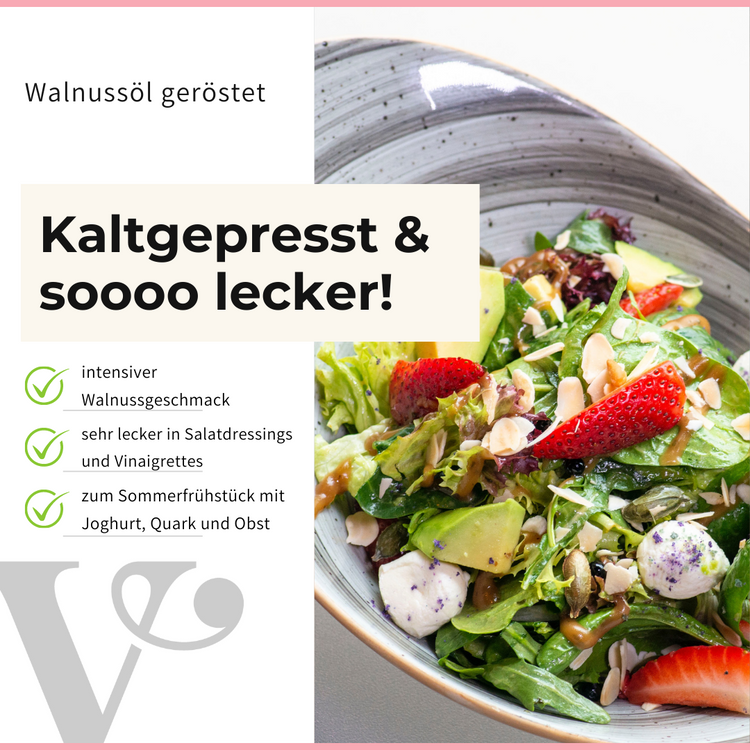 ein Bunter Blattsalat mit Erdbeereen und einem Text über kaltgepresstes Walnussöl von Vitis24