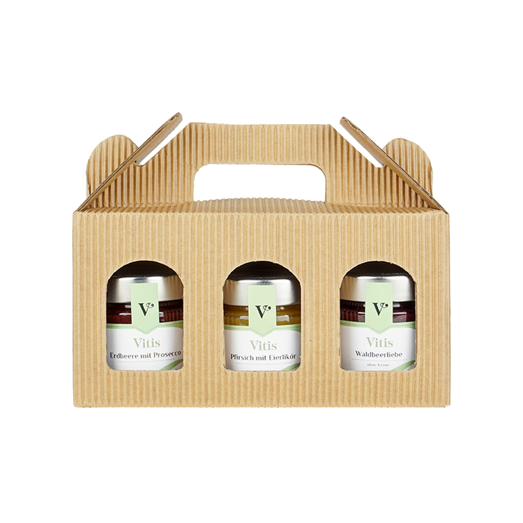 eine Geschenkbox mit den Fruchtaufstrichen Waldbeerliebe, Pfirsich mit Eierlikör und Erdbeere mit weißer Schokolade der Firma Vitis Traubenkern GmbH